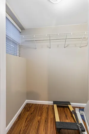 a view of a room with racks on the wall