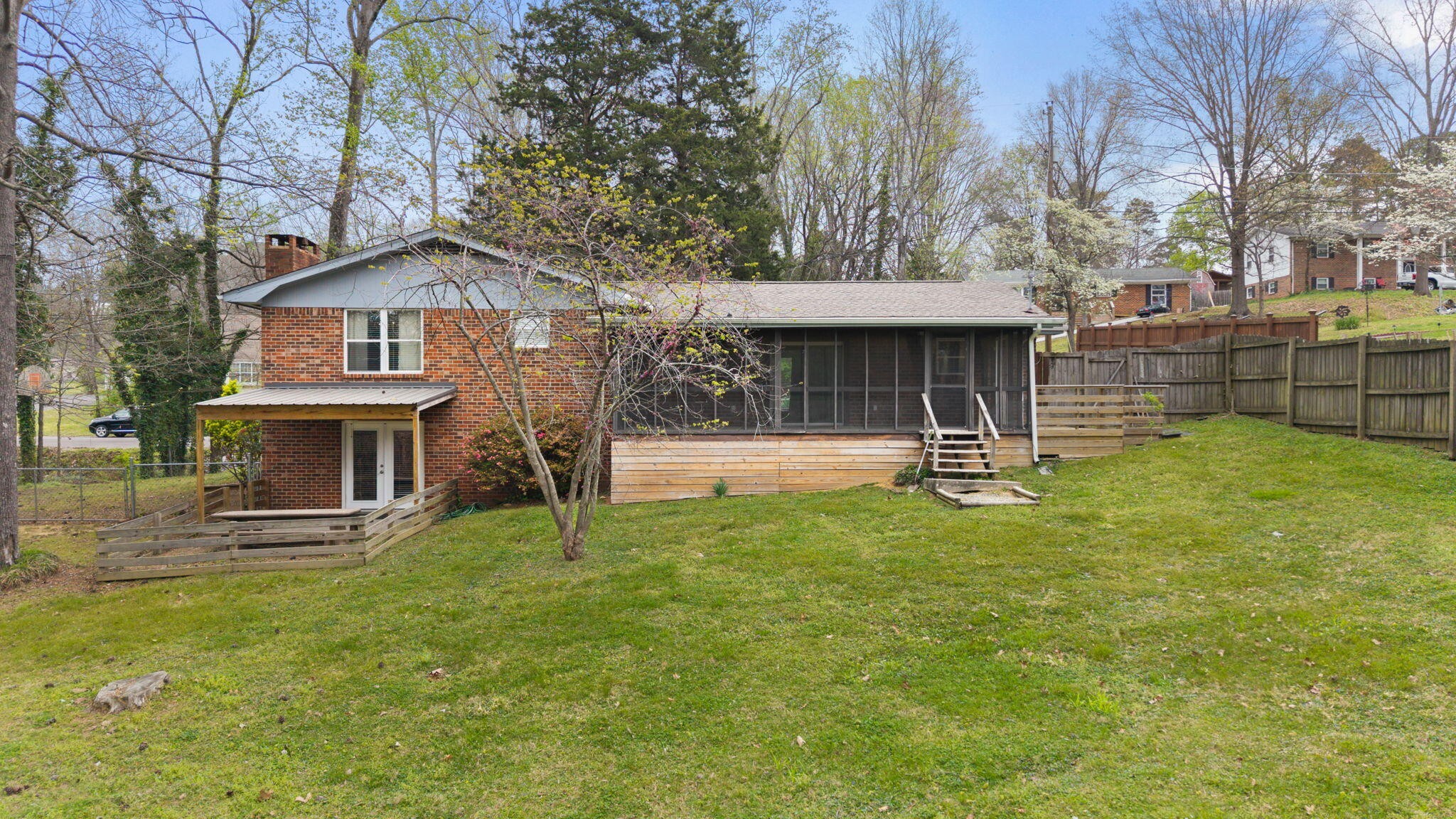 448 Apache Trail Northwest Cleveland, TN 37312 - Photo 29 of 38 a view of a house with backyard and a tree