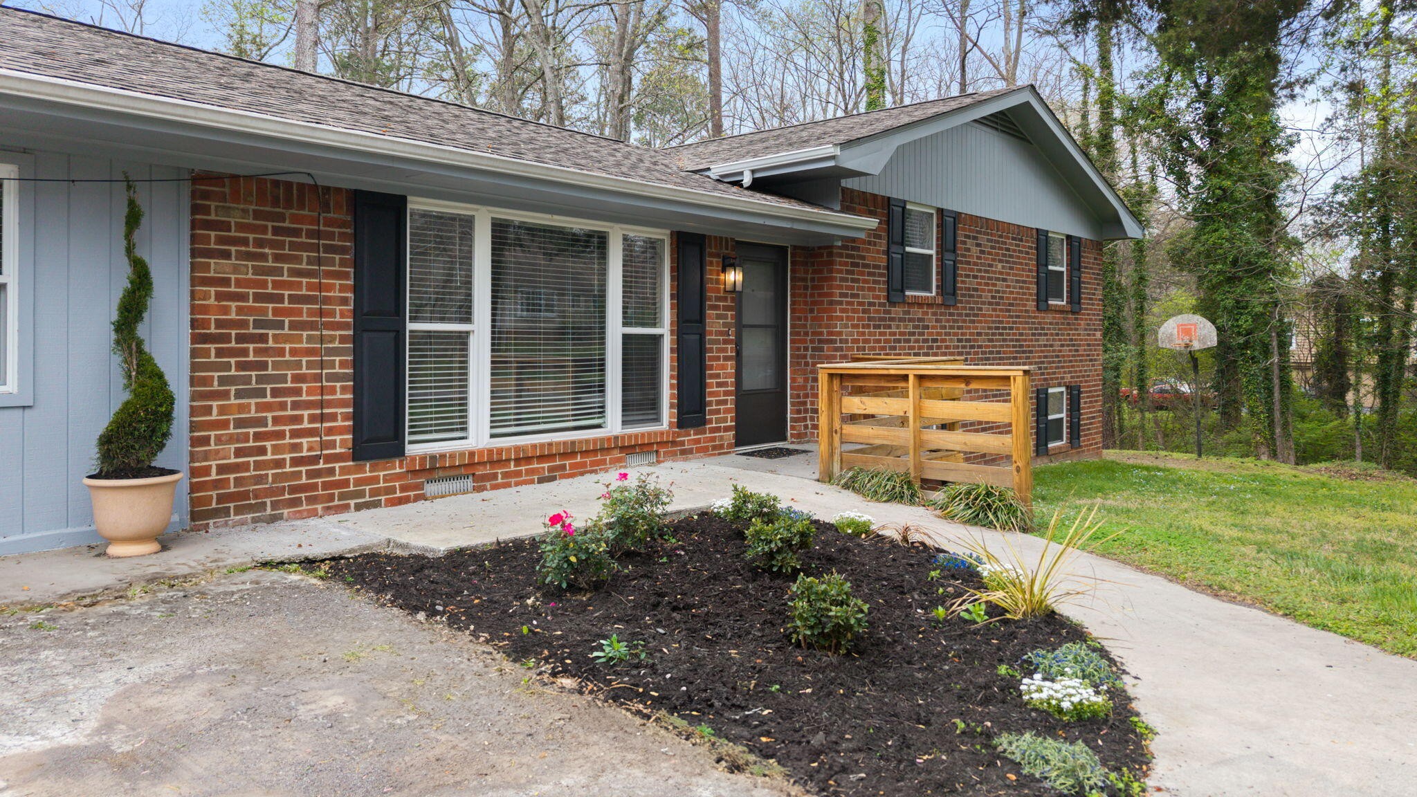 448 Apache Trail Northwest Cleveland, TN 37312 - Photo 3 of 38 a front view of a house with a yard