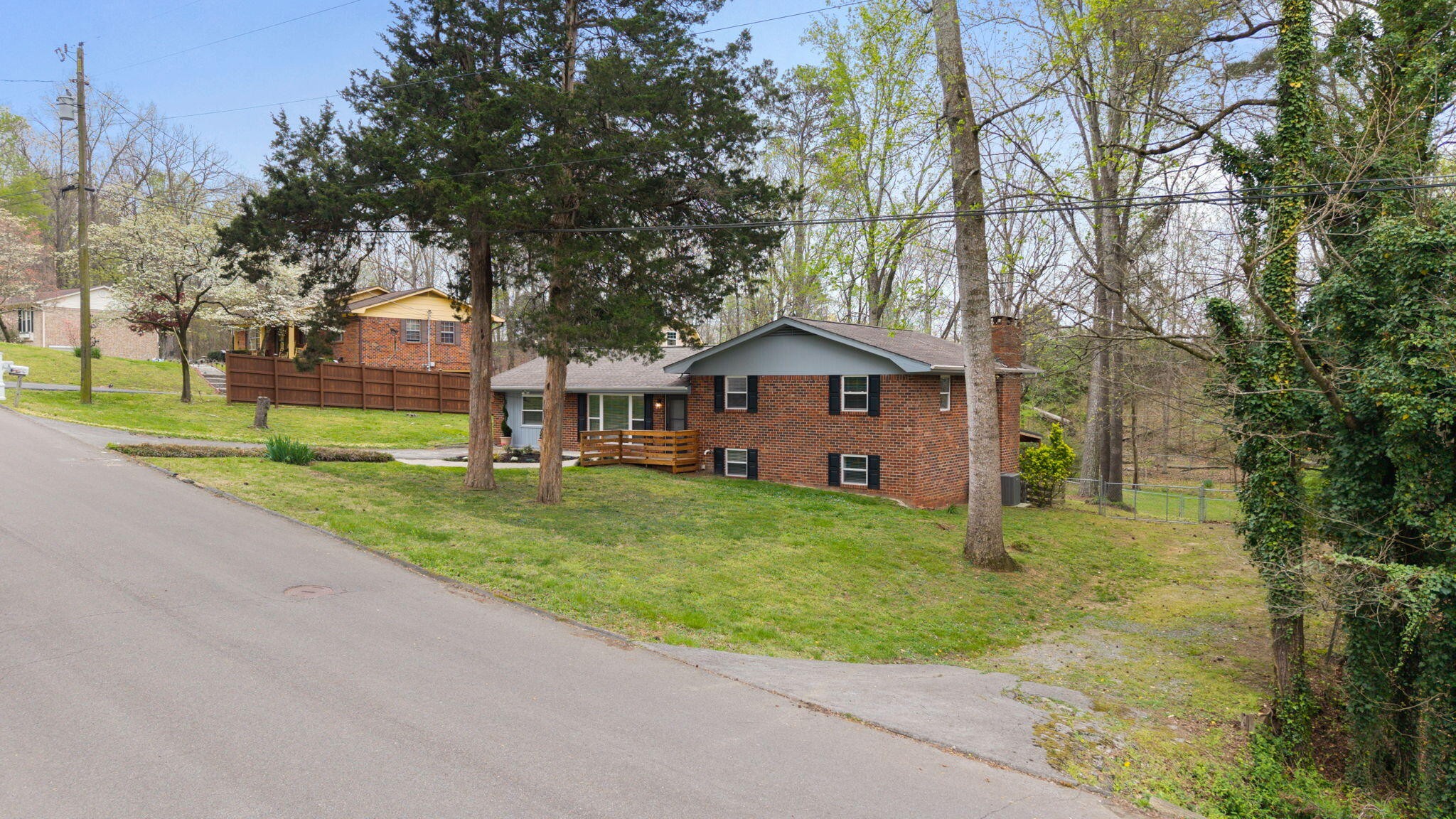 448 Apache Trail Northwest Cleveland, TN 37312 - Photo 36 of 38 a front view of house with yard and green space