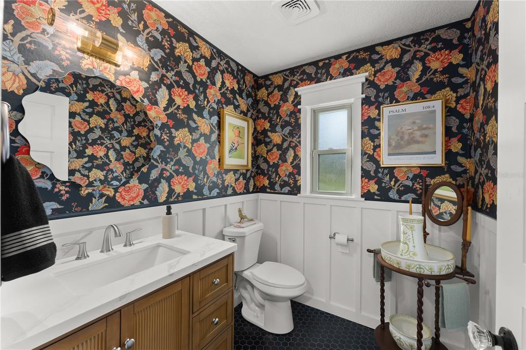 1209 Roxboro Road Longwood, FL 32750 - Photo 15 of 74 a bathroom with a sink toilet and mirror