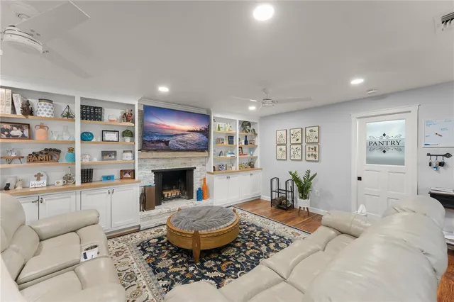 a bathroom with a sink a mirror and shower