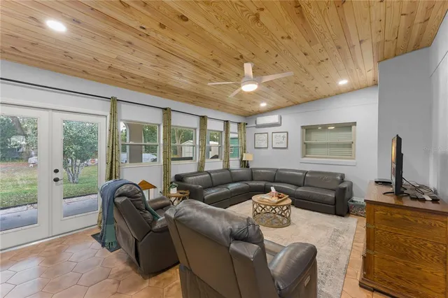 a bathroom with double vanity sinks and a mirror