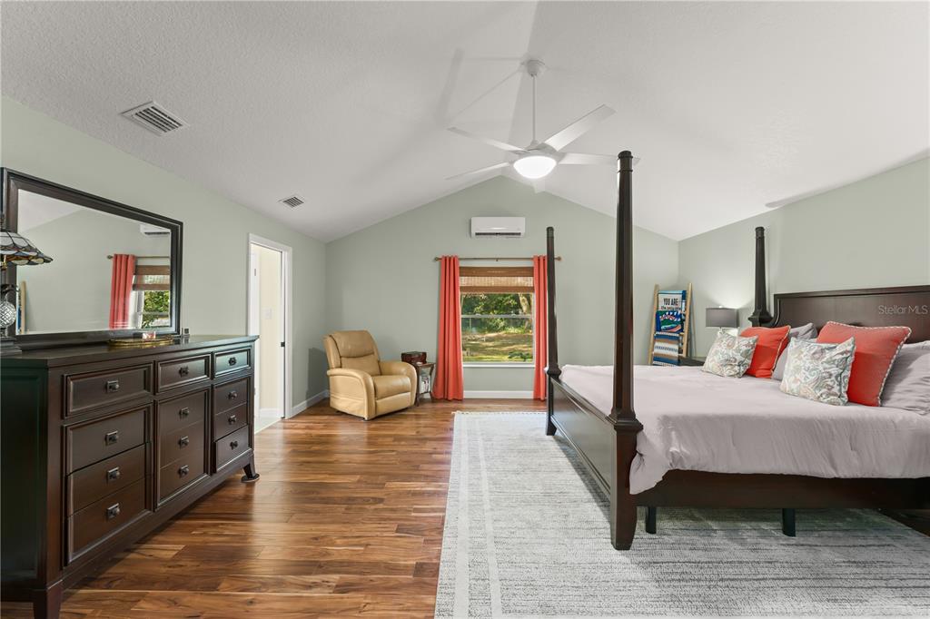 1209 Roxboro Road Longwood, FL 32750 - Photo 26 of 74 a living room with furniture and a wooden floor