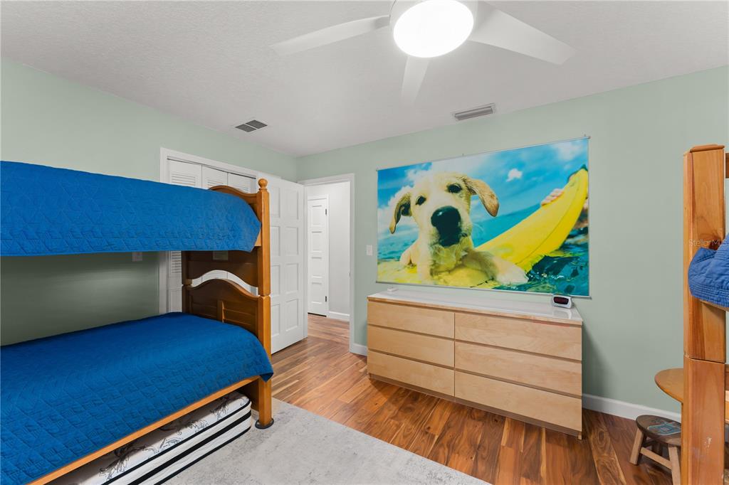 1209 Roxboro Road Longwood, FL 32750 - Photo 38 of 74 a bedroom with a bed and a dresser