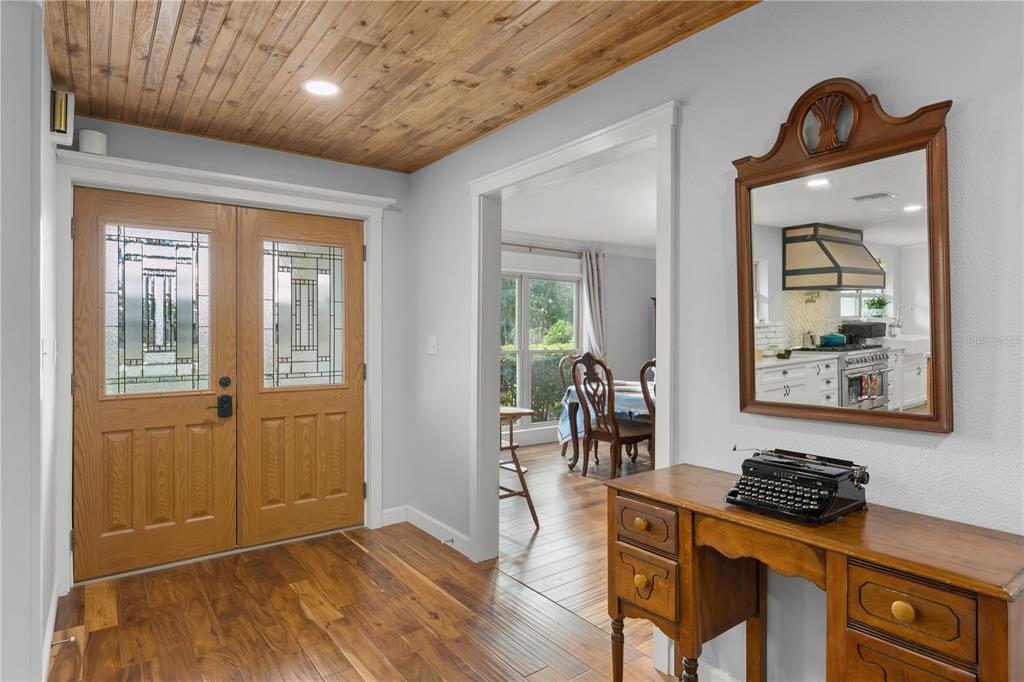 1209 Roxboro Road Longwood, FL 32750 - Photo 4 of 74 a view of a livingroom with furniture and wooden floor