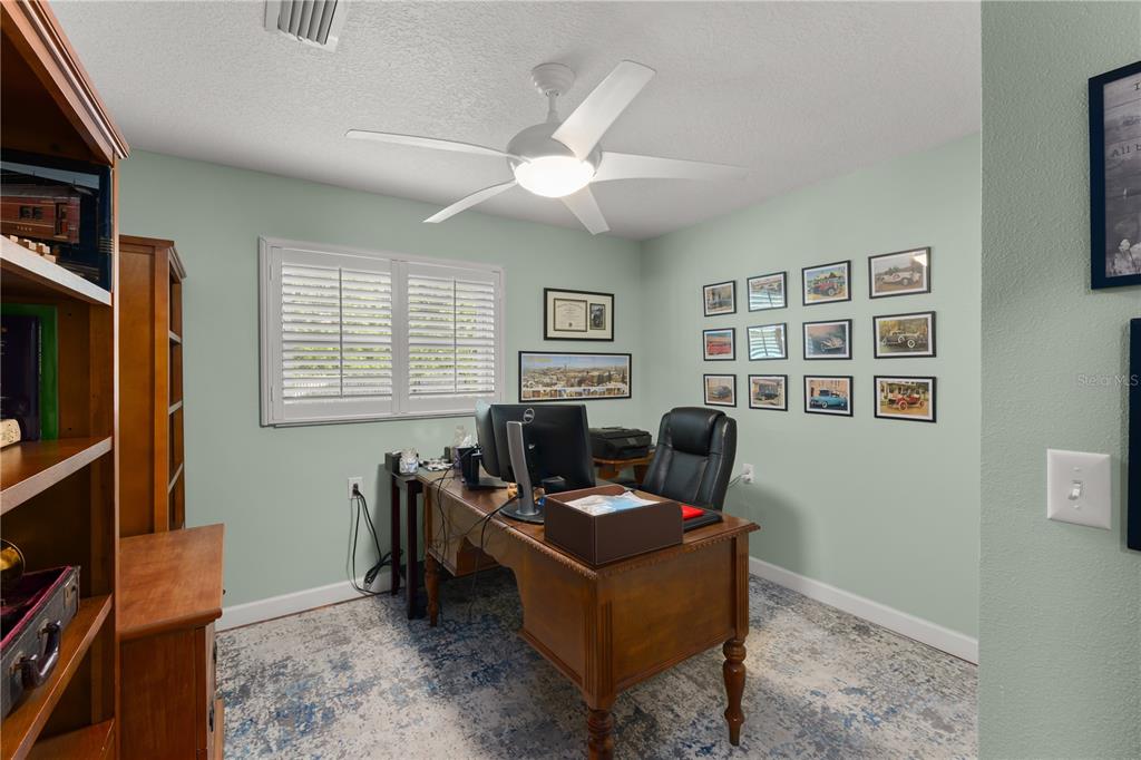 1209 Roxboro Road Longwood, FL 32750 - Photo 41 of 74 a living room with furniture window and flat screen tv