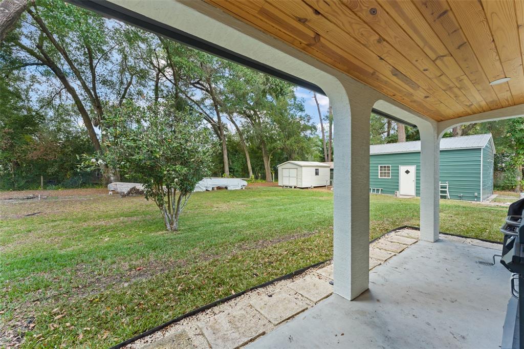 1209 Roxboro Road Longwood, FL 32750 - Photo 47 of 74 a house view with a garden space
