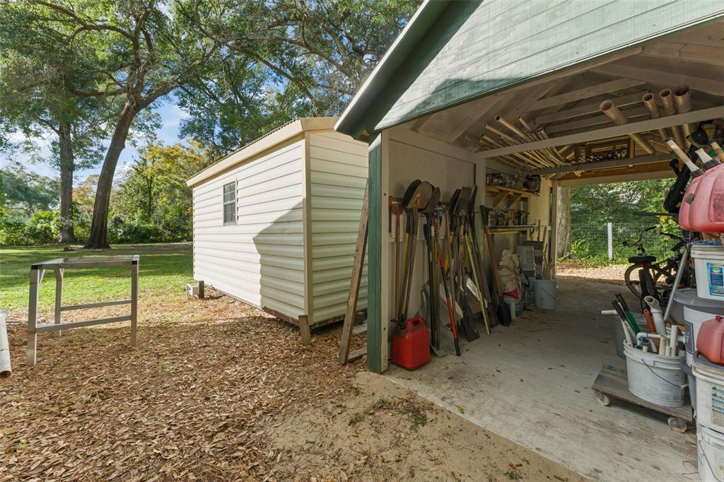 1209 Roxboro Road Longwood, FL 32750 - Photo 48 of 74 a view of a house with a backyard
