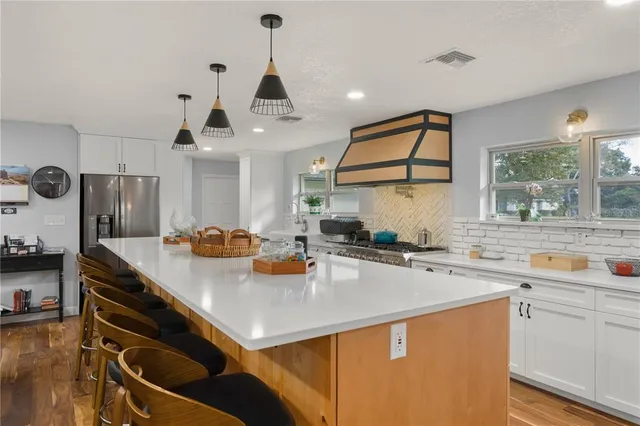 a bathroom with a sink toilet and mirror