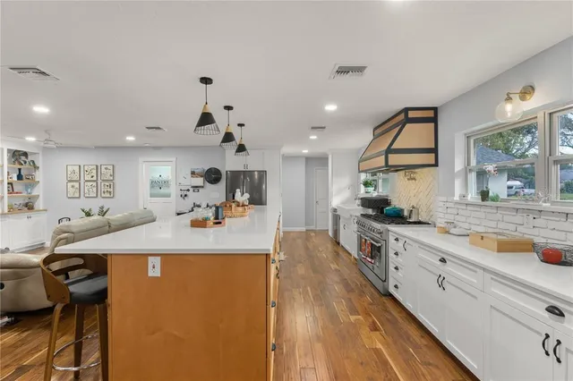 a view of a workspace with furniture