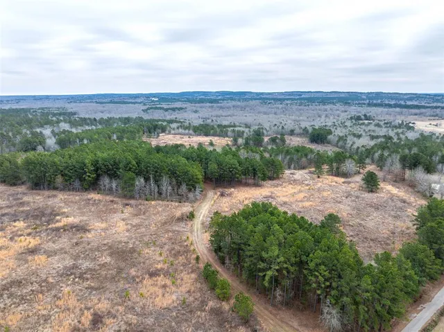 an aerial view of mountain with outdoor space