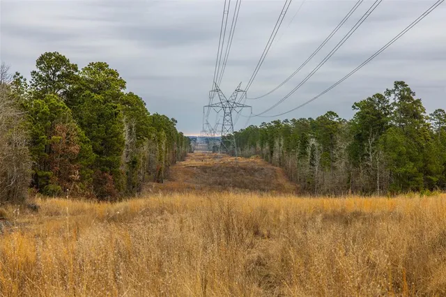 a view of a lake view with houses in back