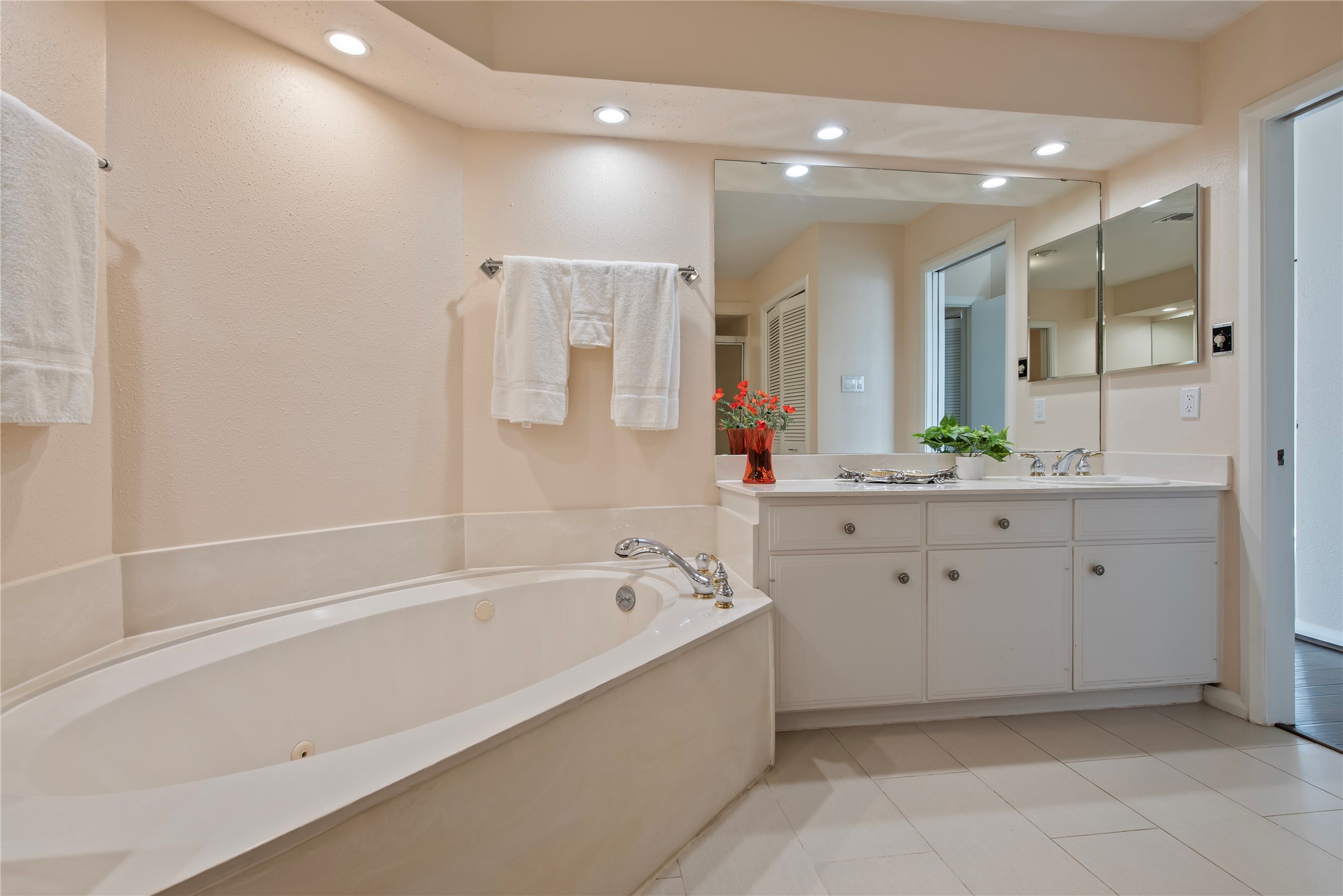 2037 Enterprise Avenue League City, TX 77573 - Photo 25 of 49 a spacious bathroom with a tub sink shower and mirror