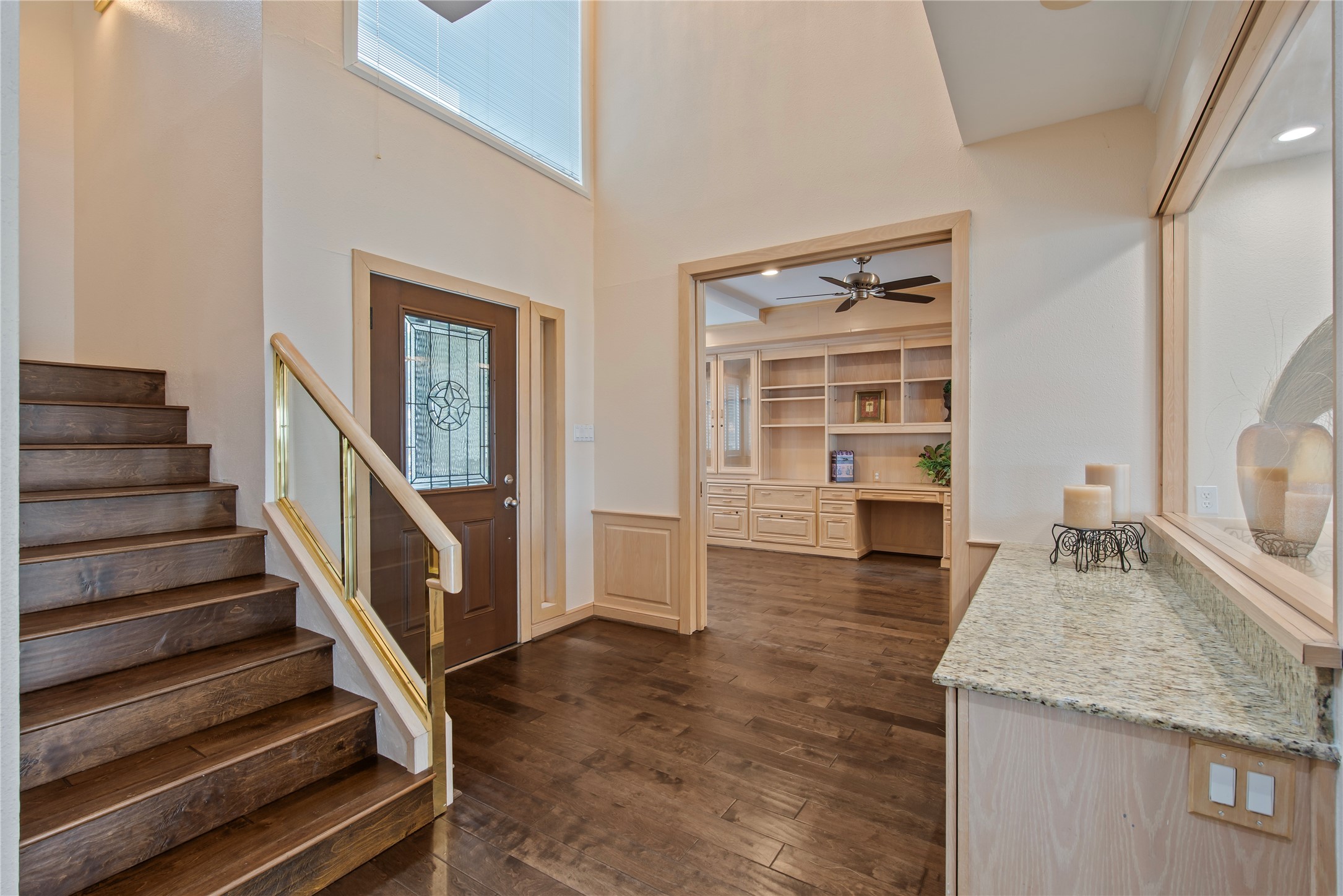 2037 Enterprise Avenue League City, TX 77573 - Photo 3 of 49 a view of a living room with wooden floor and staircase