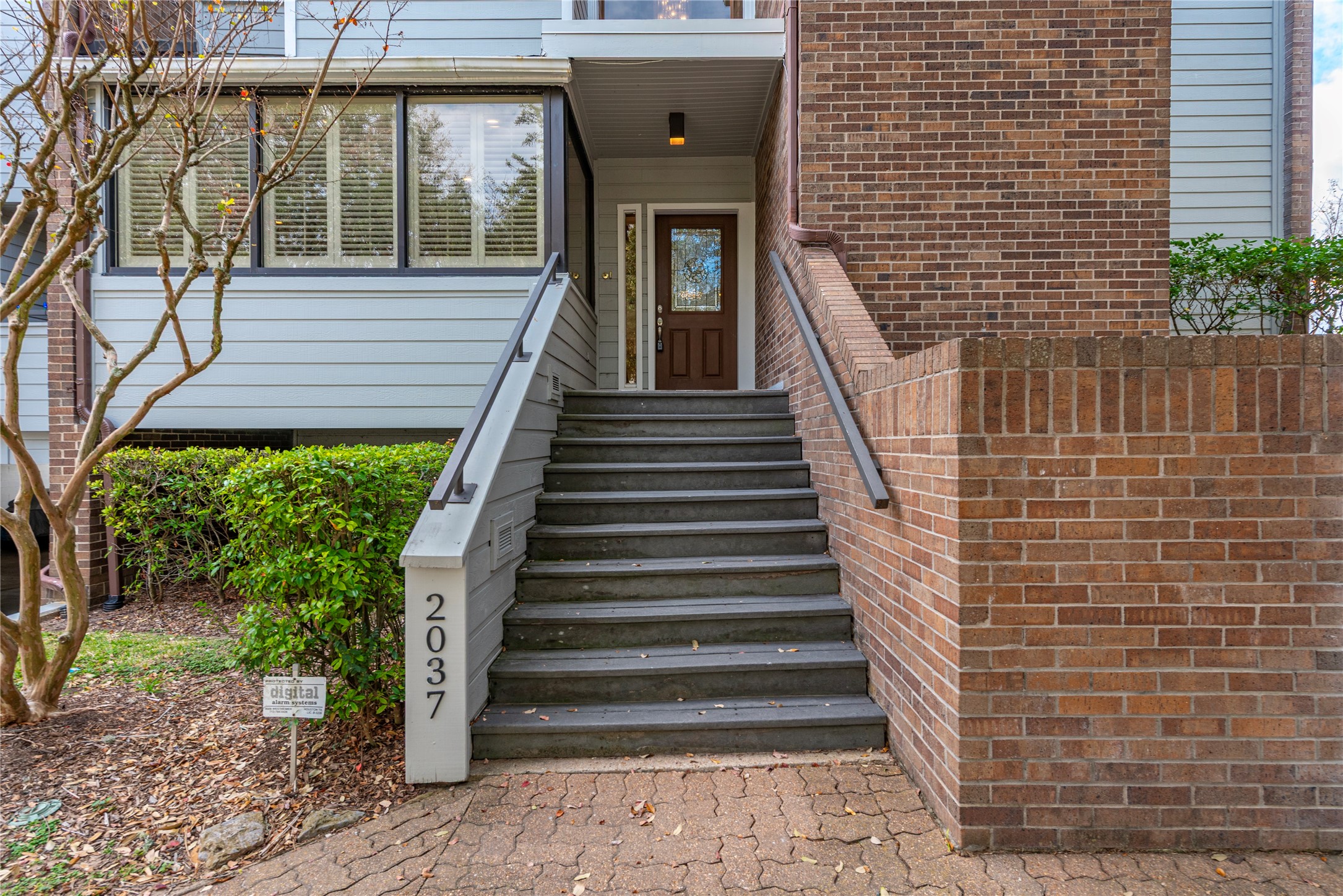 2037 Enterprise Avenue League City, TX 77573 - Photo 39 of 49 a view of a house with entryway and stairs