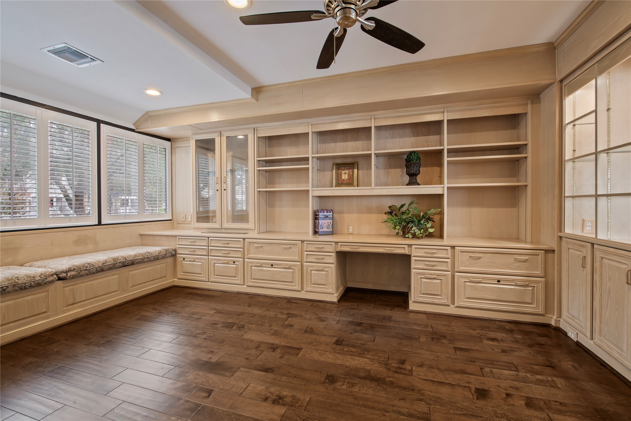 2037 Enterprise Avenue League City, TX 77573 - Photo 5 of 49 a large white kitchen with granite countertop a large window and white cabinets