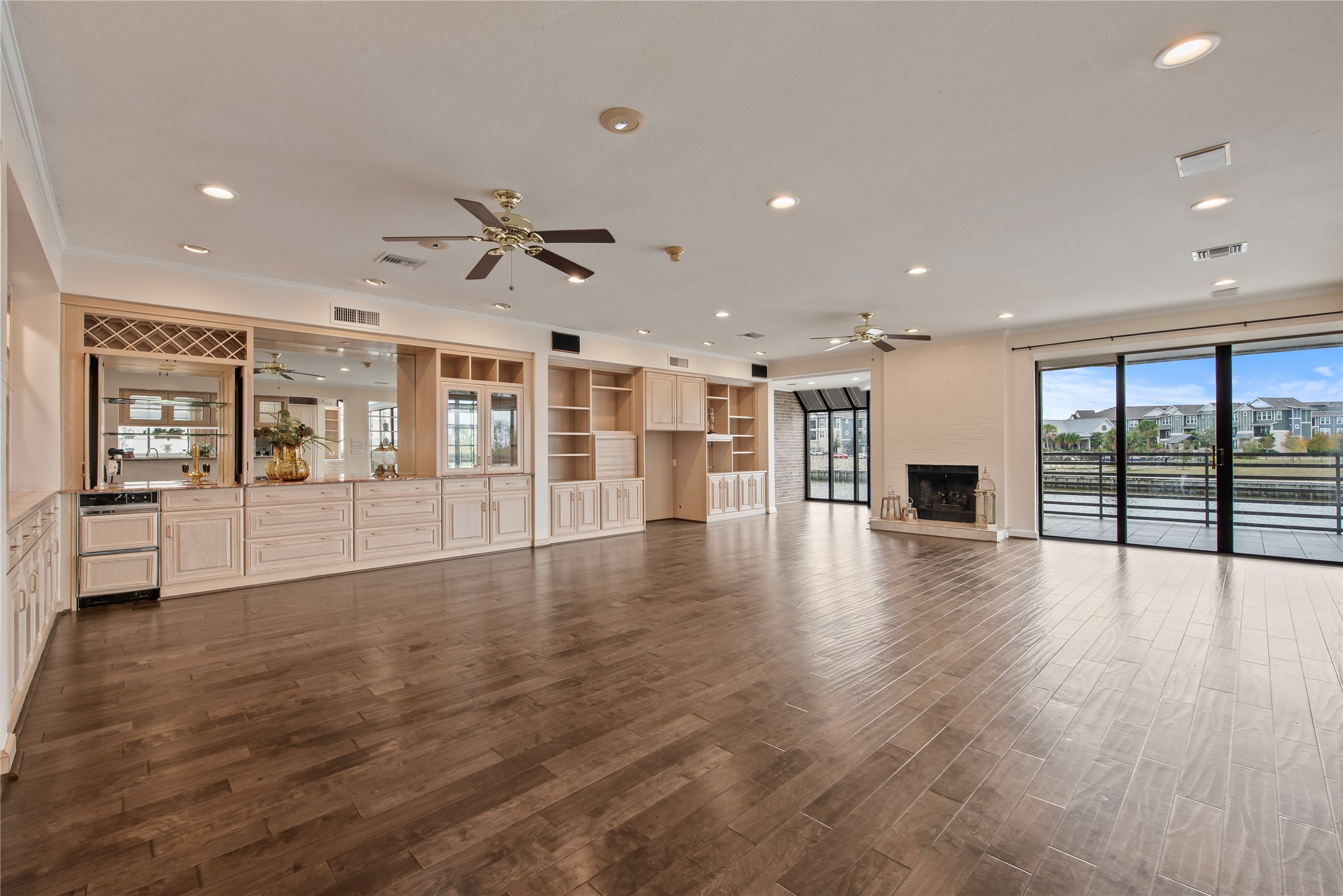 2037 Enterprise Avenue League City, TX 77573 - Photo 8 of 49 an empty room with wooden floor and large windows