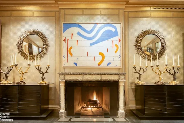 a living room with a fireplace