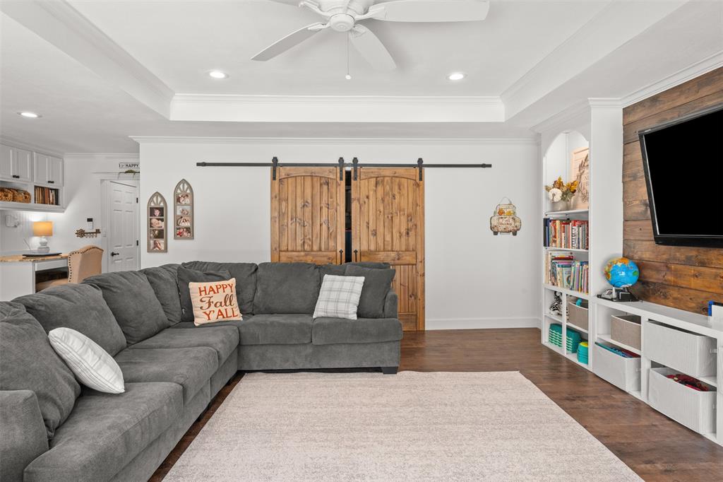 3050 Bosque Ridge Road Crawford, TX 76638 - Photo 22 of 40 a living room with furniture and a flat screen tv