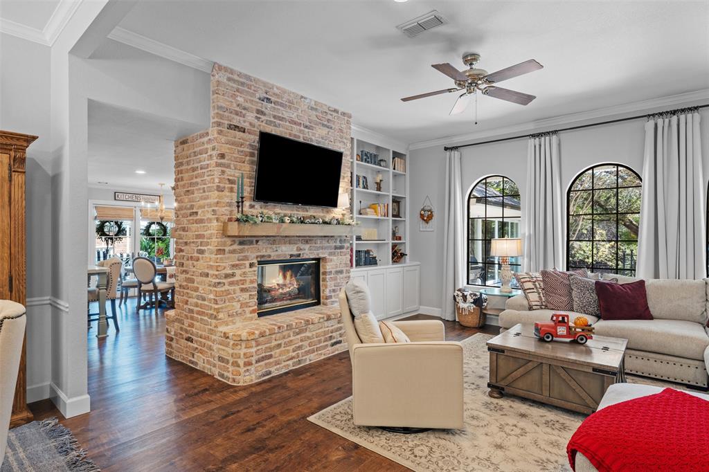 3050 Bosque Ridge Road Crawford, TX 76638 - Photo 7 of 40 a living room with fireplace furniture and a flat screen tv