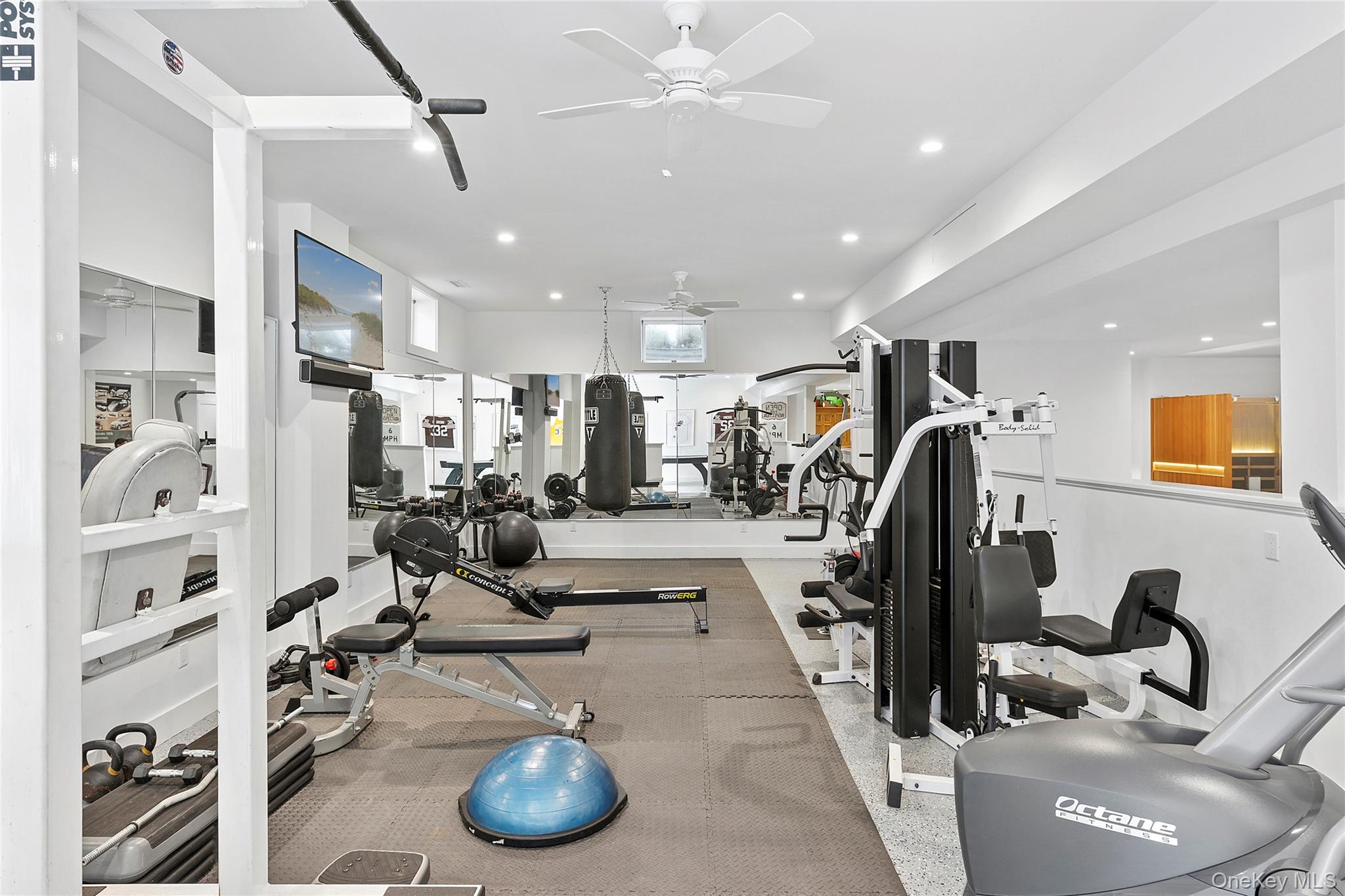 198 2 Holes Water Road East Hampton, NY 11937 - Photo 22 of 25 a view of a room with gym equipment