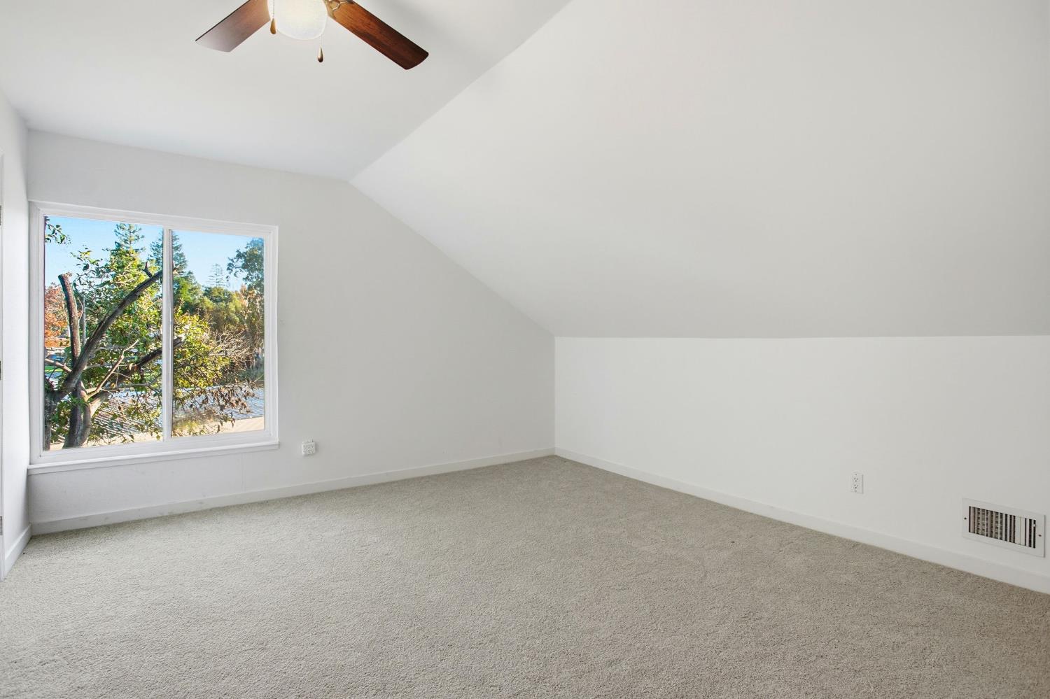 3801 Woodcrest Road Sacramento, CA 95821 - Photo 22 of 35 an empty room with windows