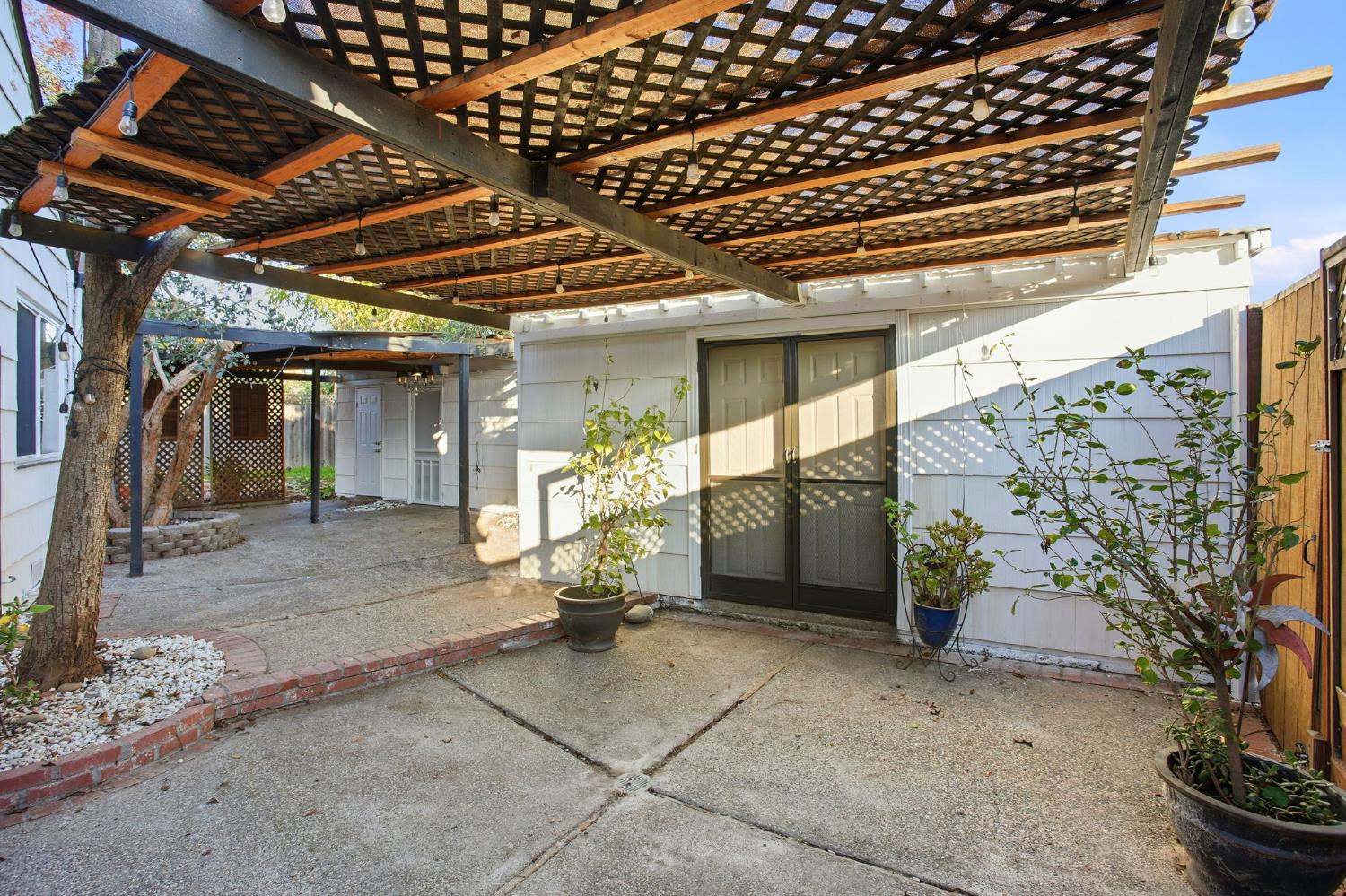 3801 Woodcrest Road Sacramento, CA 95821 - Photo 26 of 35 a view of porch with a table and chairs