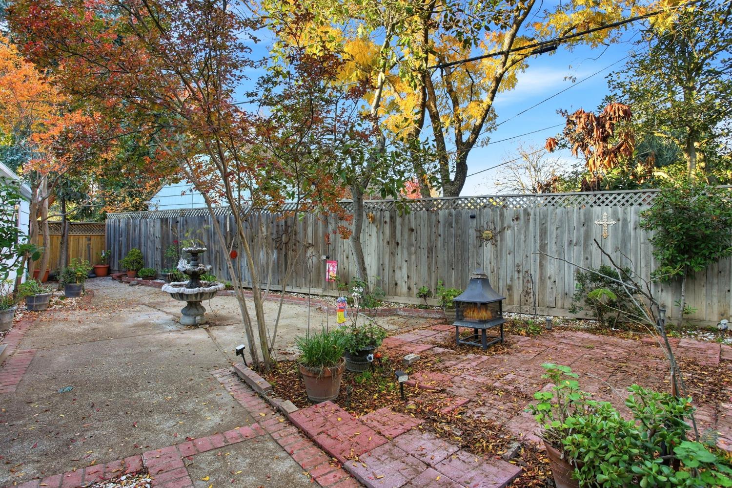 3801 Woodcrest Road Sacramento, CA 95821 - Photo 31 of 35 a view of outdoor space with seating area and trees
