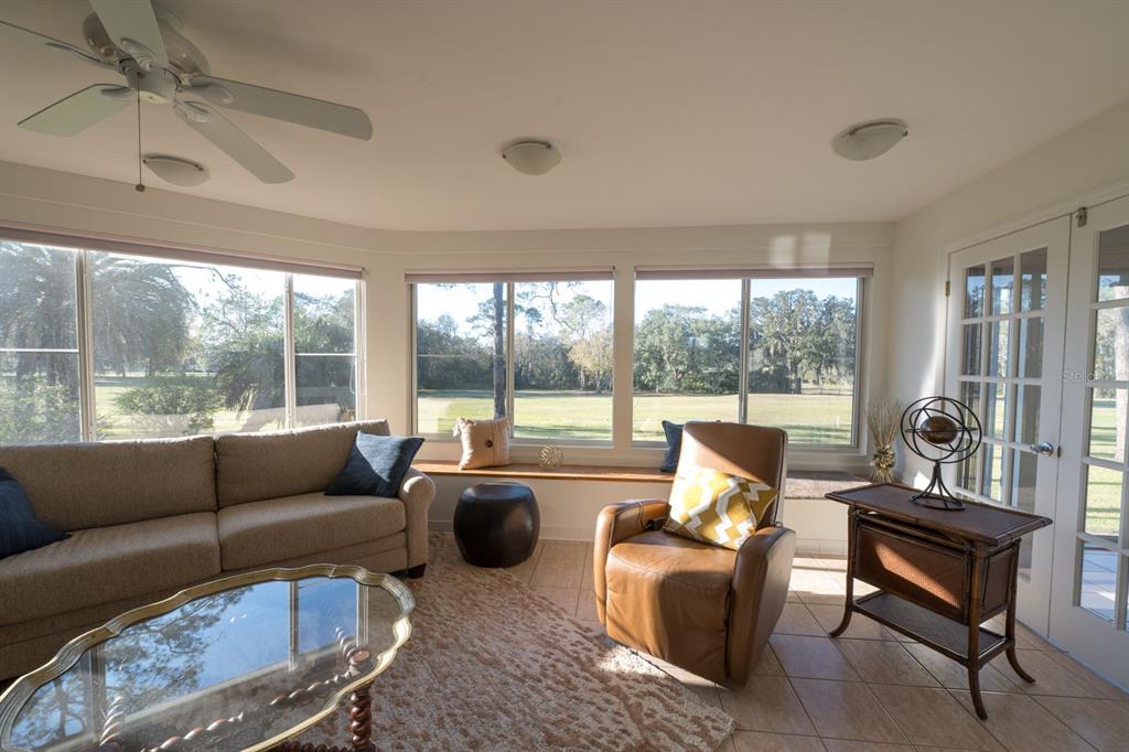 3300 Southwest 62nd Lane Gainesville, FL 32608 - Photo 27 of 34 a living room with furniture and a large window