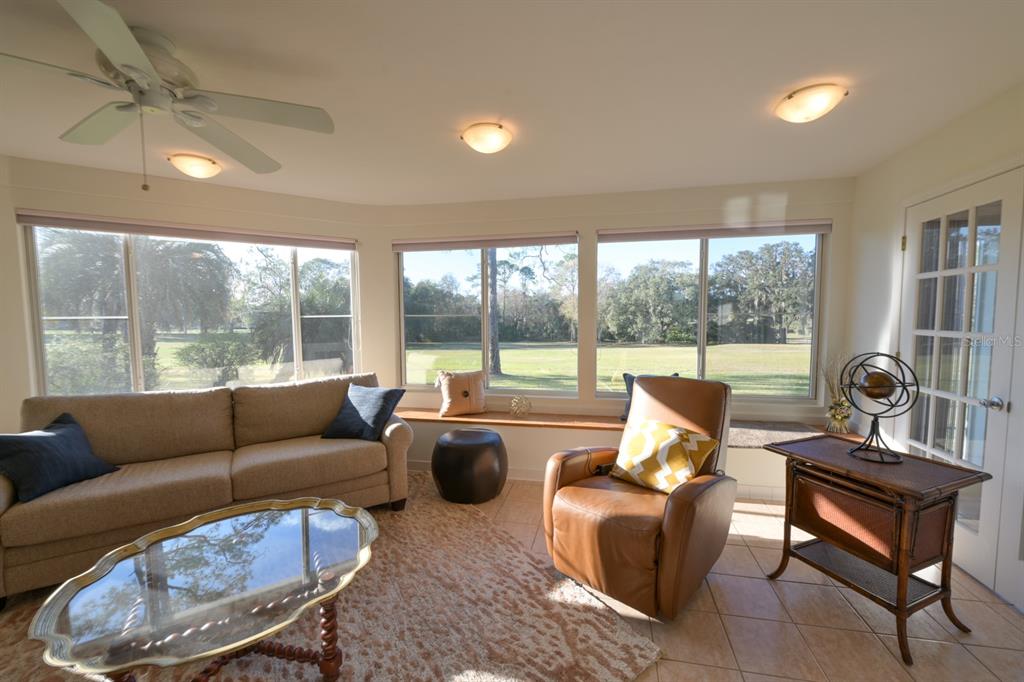 3300 Southwest 62nd Lane Gainesville, FL 32608 - Photo 29 of 34 a living room with furniture and a large window