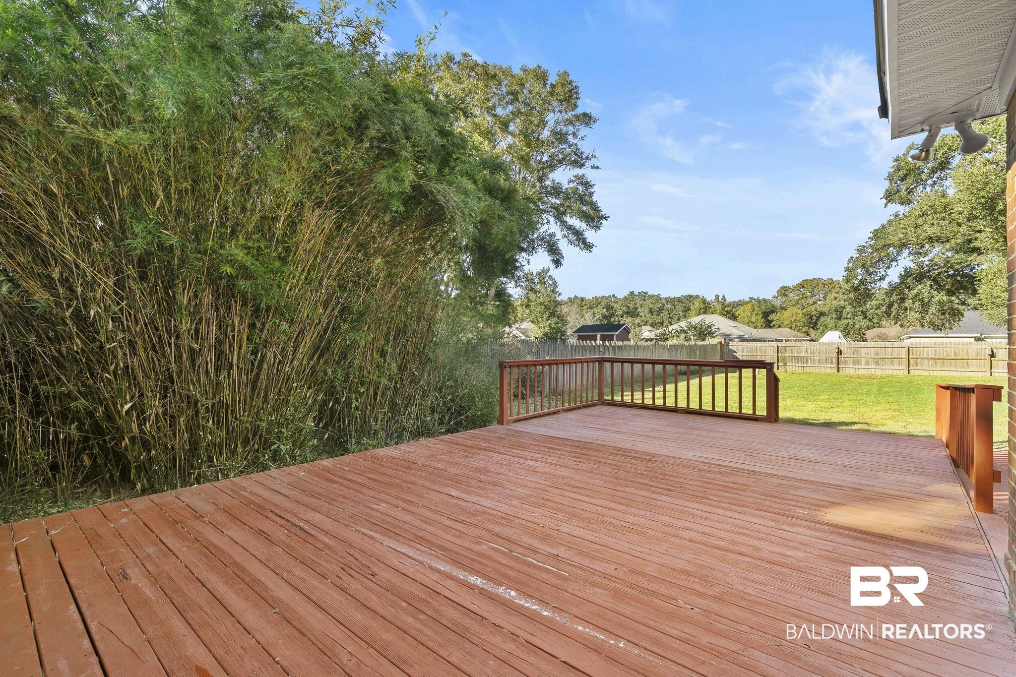 9631 Bay Meadows Avenue Fairhope, AL 36532 - Photo 38 of 49 Deck featuring a lawn