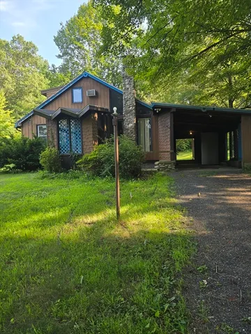 a house view with a outdoor space