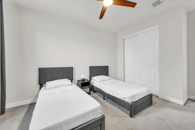 a view of empty room with windows