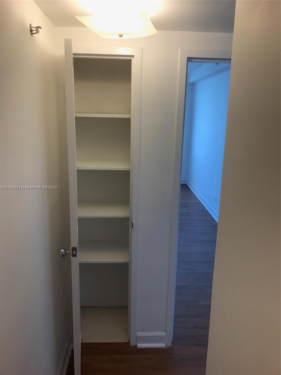 1500 Bay Road, Unit 944S Miami Beach, FL 33139 - Photo 22 of 82 a view of walk in closet with empty racks