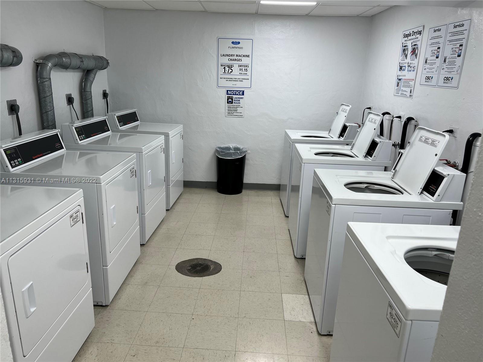 1500 Bay Road, Unit 944S Miami Beach, FL 33139 - Photo 32 of 82 a utility room with dryer and washer