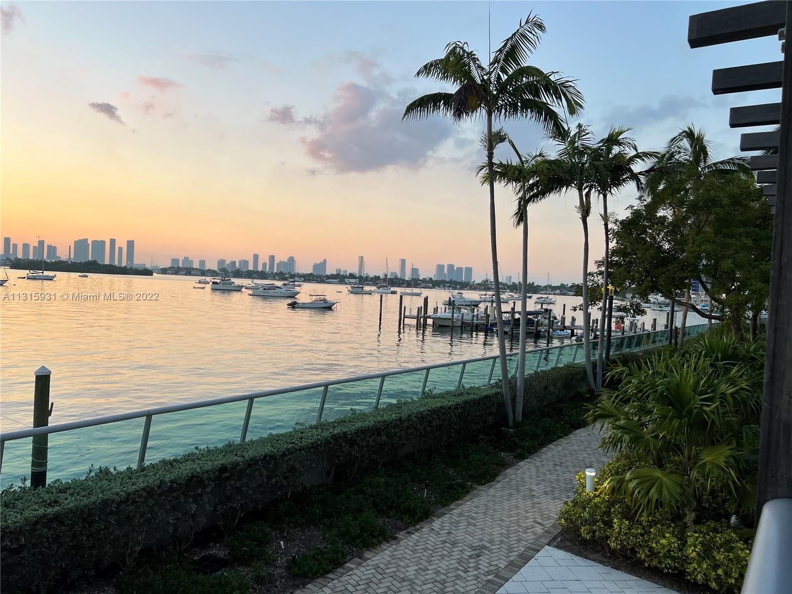 1500 Bay Road, Unit 944S Miami Beach, FL 33139 - Photo 44 of 82 a view of a lake with a garden