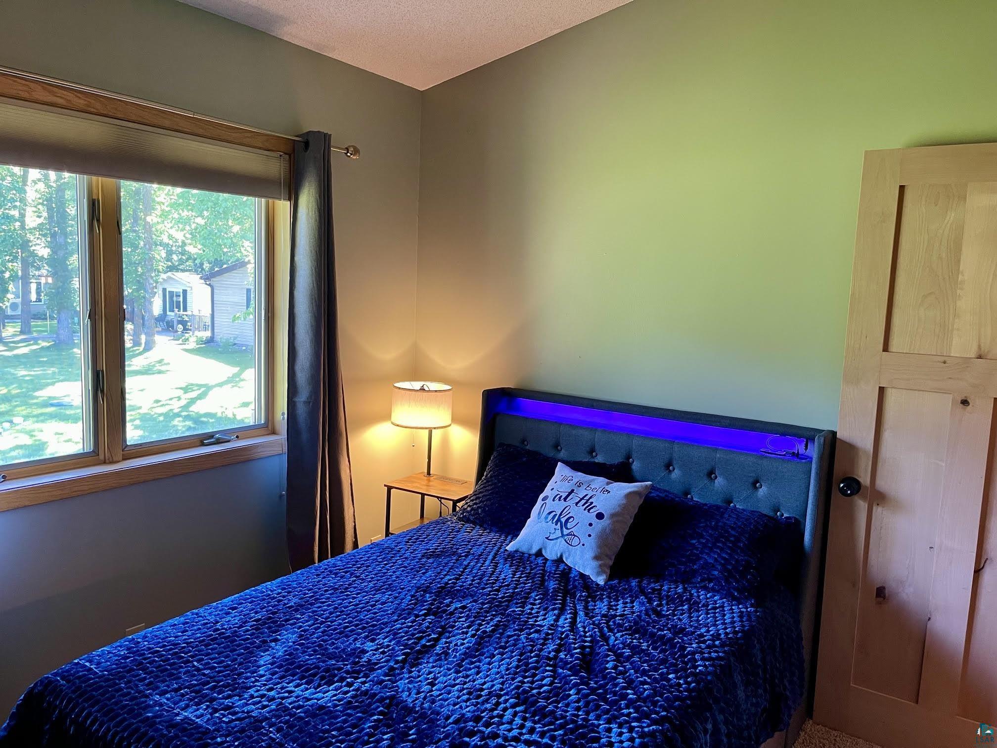37460 Sunrise View Road Sturgeon Lake, MN 55783 - Photo 27 of 50 Middle bedroom.