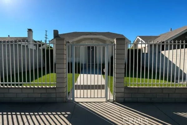 a view of a balcony with two chairs