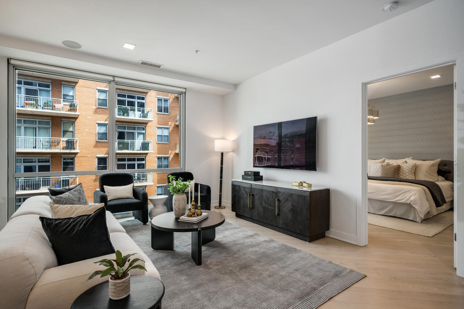 1000 West Monroe Street, Unit 502 Chicago, IL 60607 - Photo 16 of 29 a living room with furniture and a flat screen tv