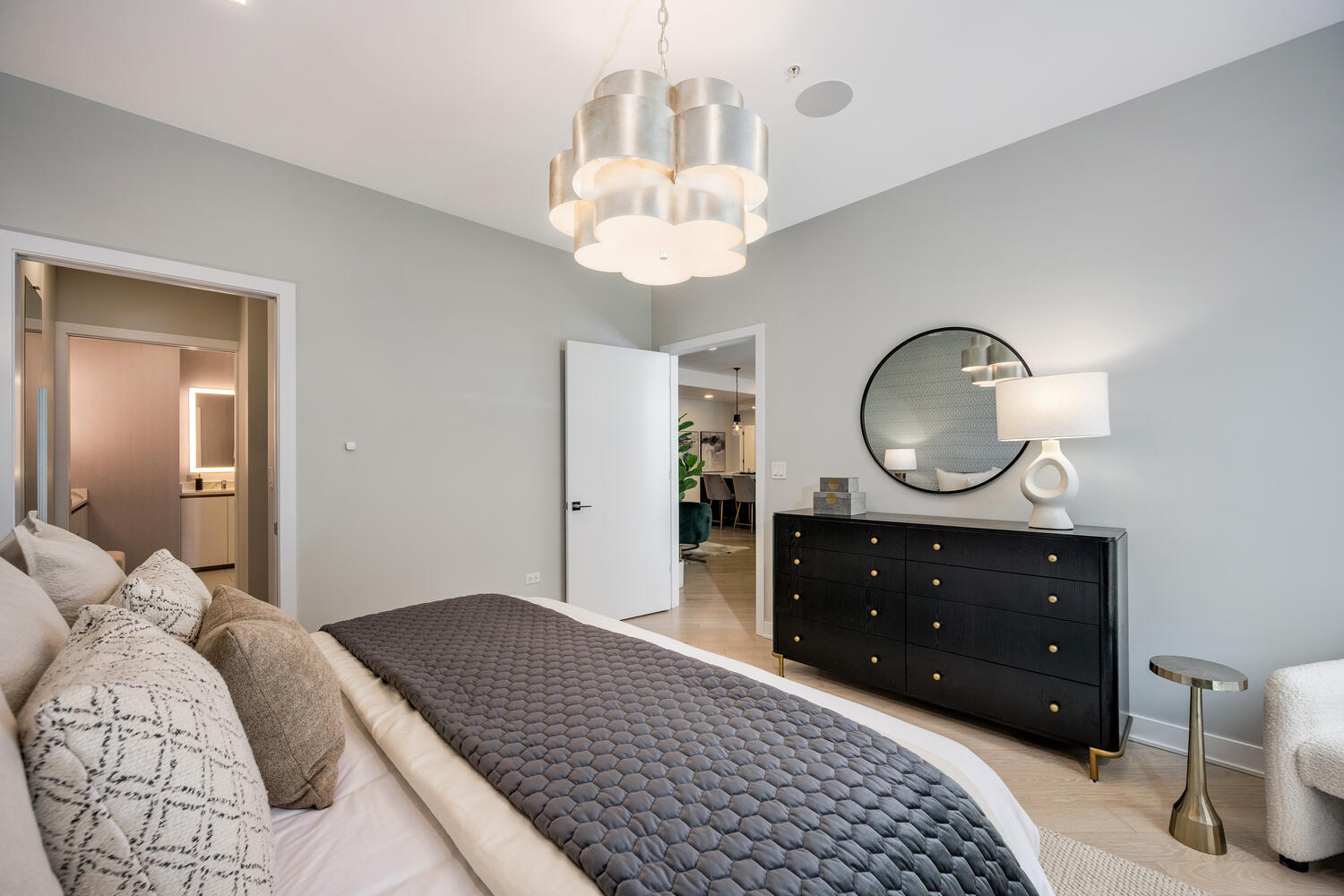 1000 West Monroe Street, Unit 502 Chicago, IL 60607 - Photo 18 of 29 a bedroom with a bed and wooden floor