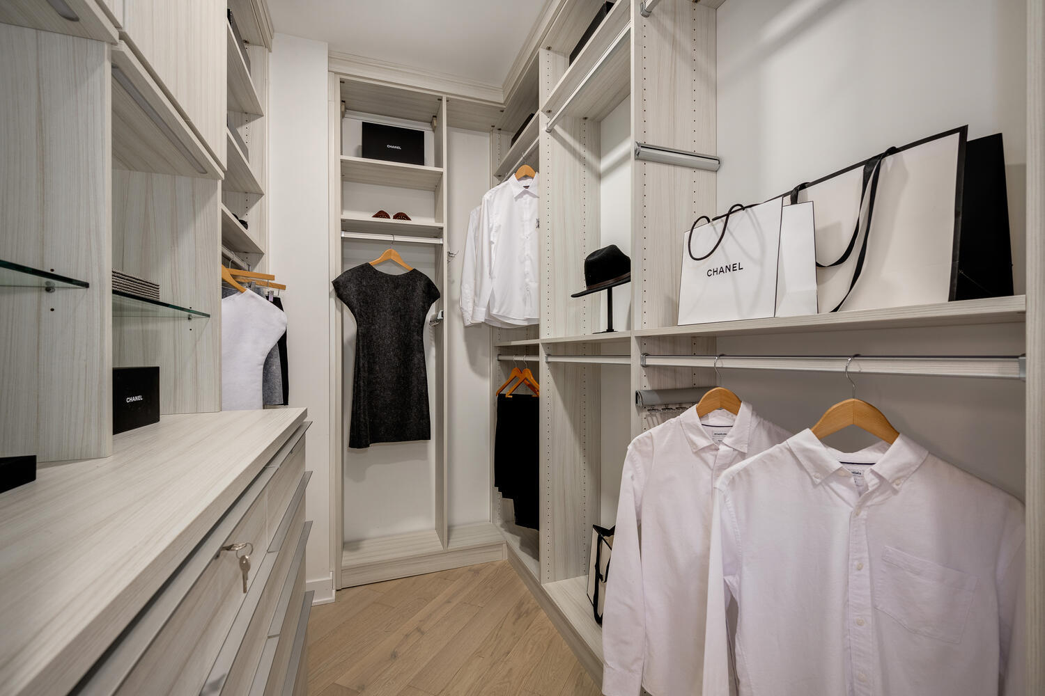 1000 West Monroe Street, Unit 502 Chicago, IL 60607 - Photo 19 of 29 a view of walk in closet with clothes and shoes