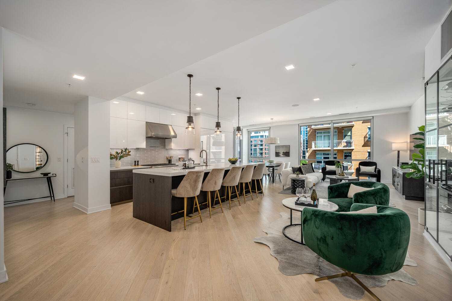 1000 West Monroe Street, Unit 502 Chicago, IL 60607 - Photo 2 of 29 a living room with lots of furniture and kitchen view