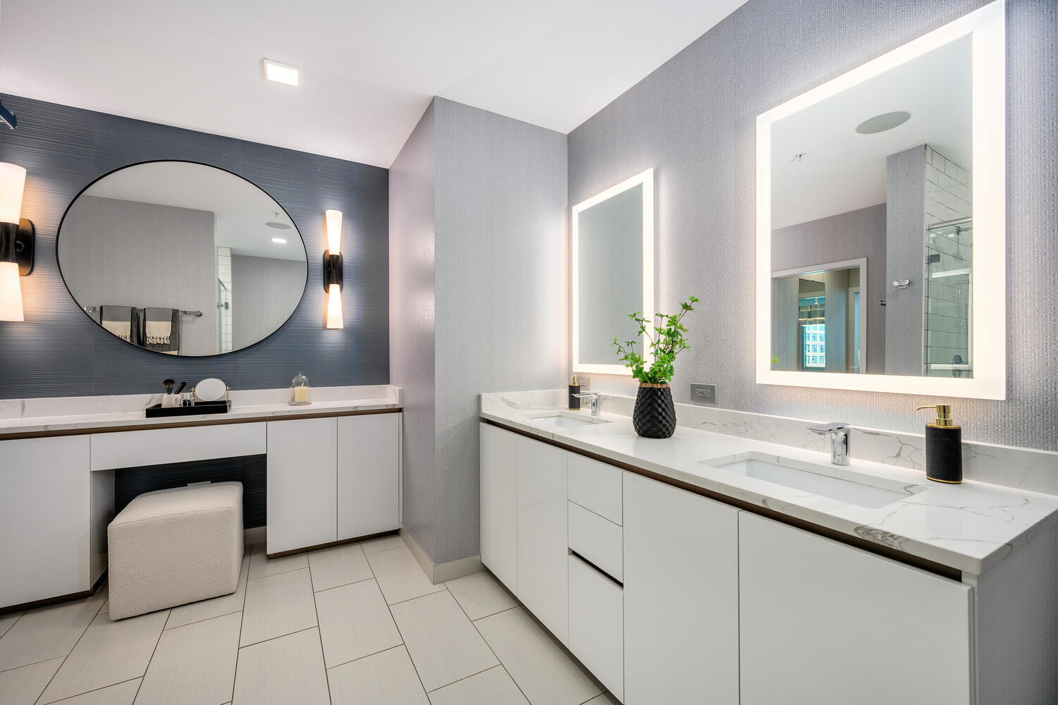 1000 West Monroe Street, Unit 502 Chicago, IL 60607 - Photo 21 of 29 a bathroom with a double vanity sink and a mirror