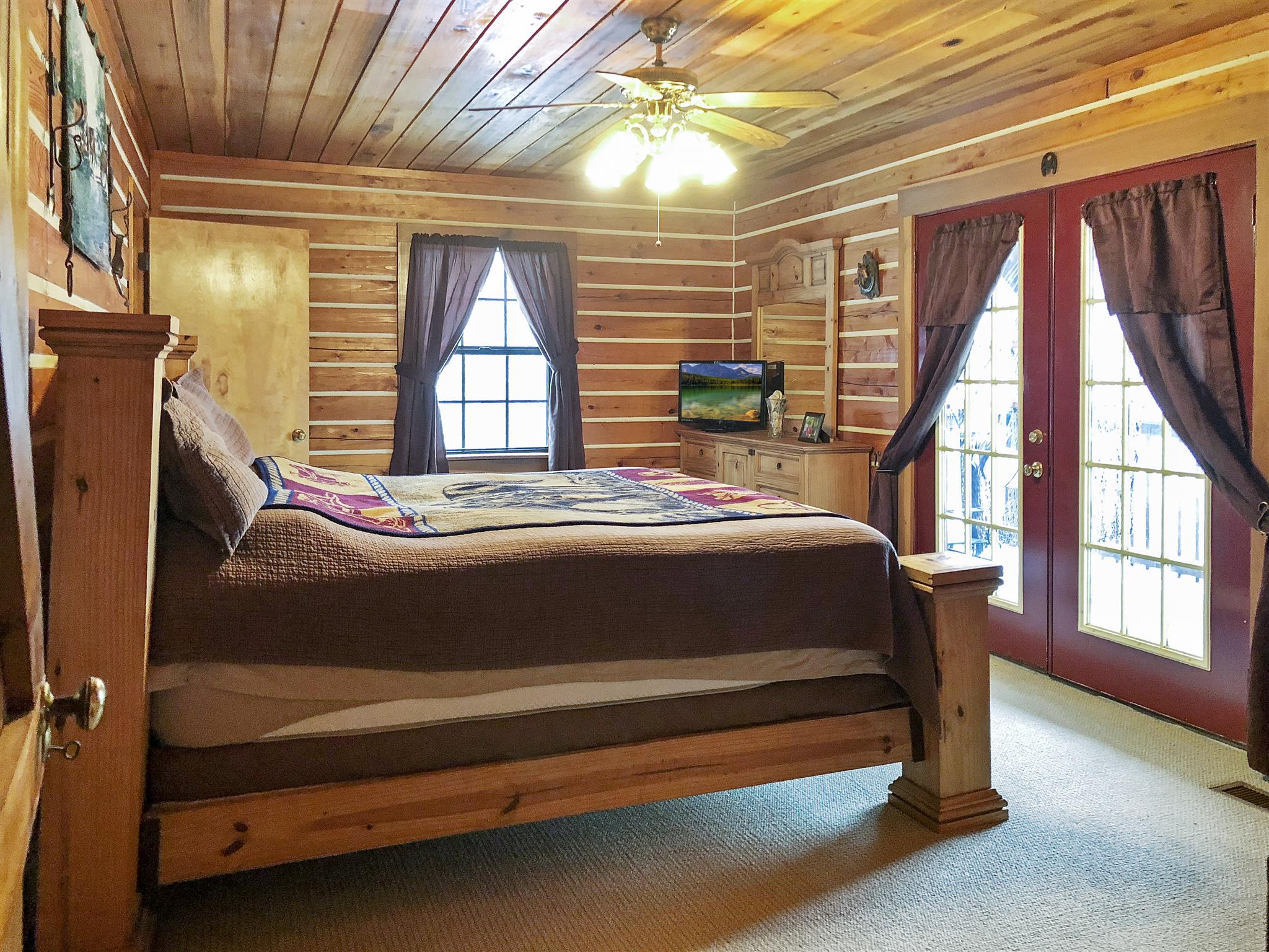 121 Edenway Road Dover, TN 37058 - Photo 12 of 24 Master bedroom with full bath, walk in closet and private entrance to covered deck