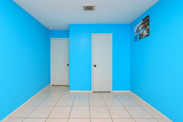 a room with furniture and a wooden floor