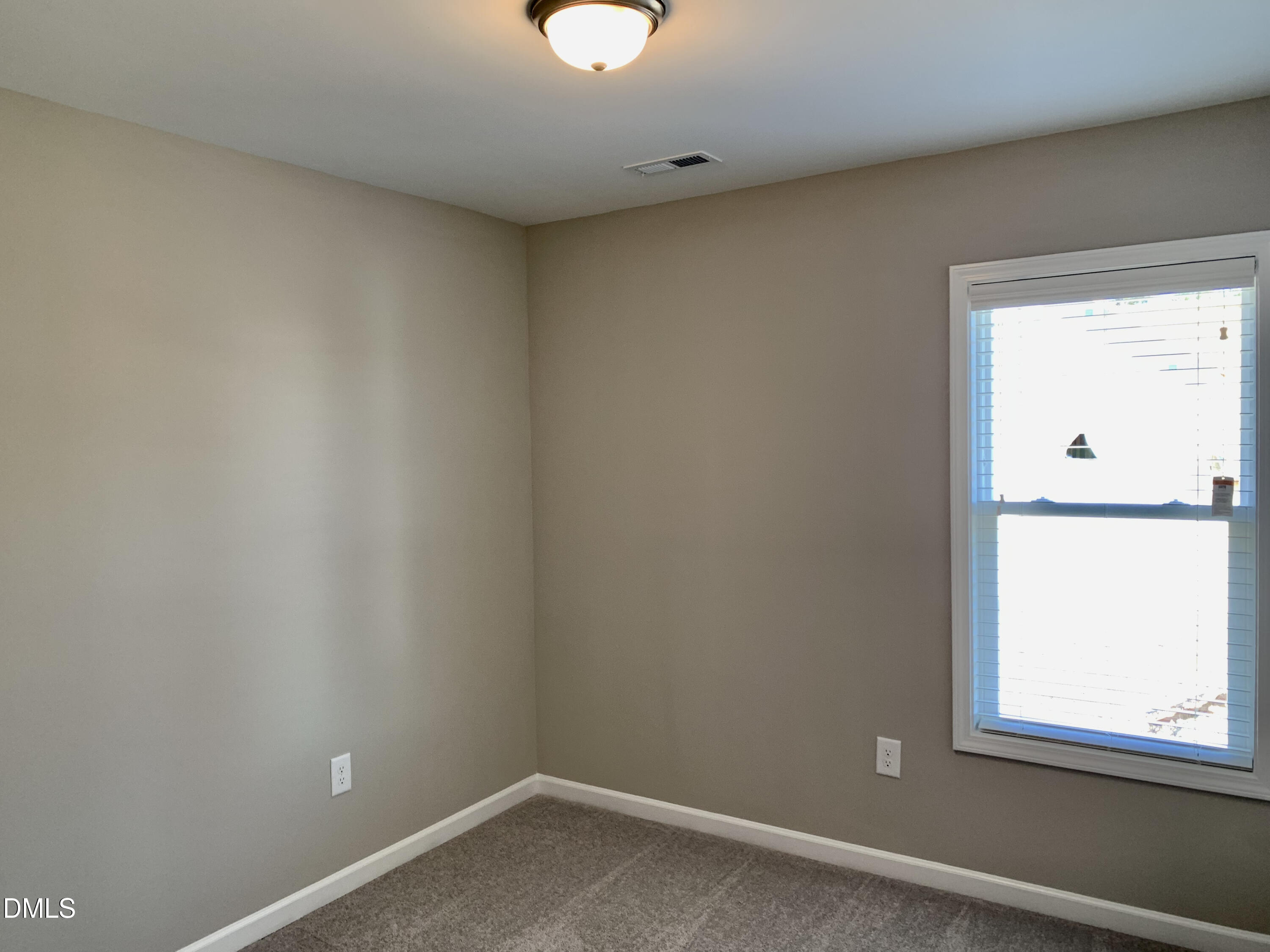 48 Weathervane Dr. Zebulon, NC 27597 - Photo 9 of 24 a view of a small space with window
