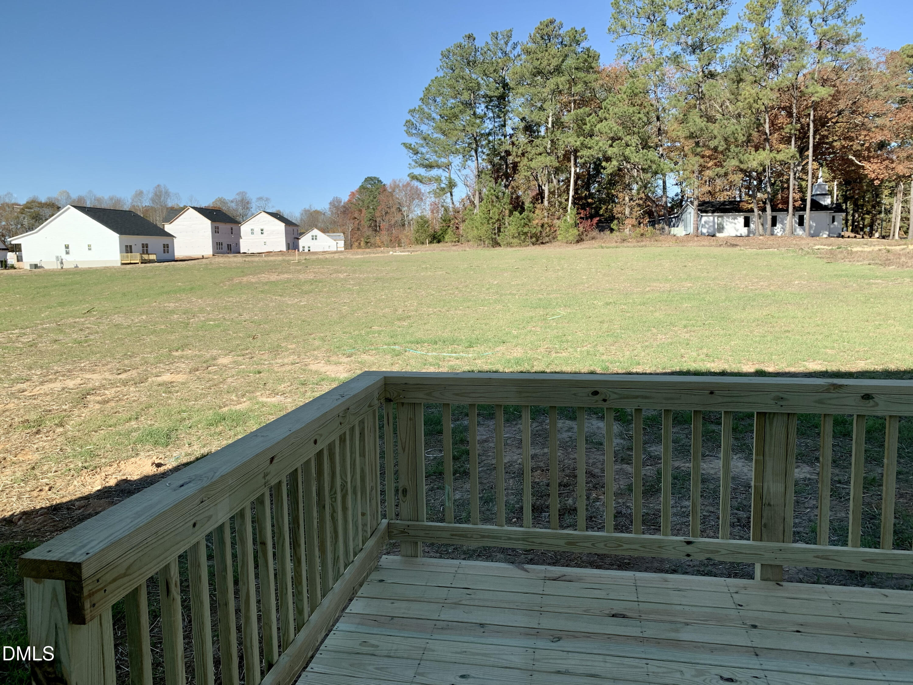 48 Weathervane Dr. Zebulon, NC 27597 - Photo 18 of 24 a view of a swimming pool and an outdoor space
