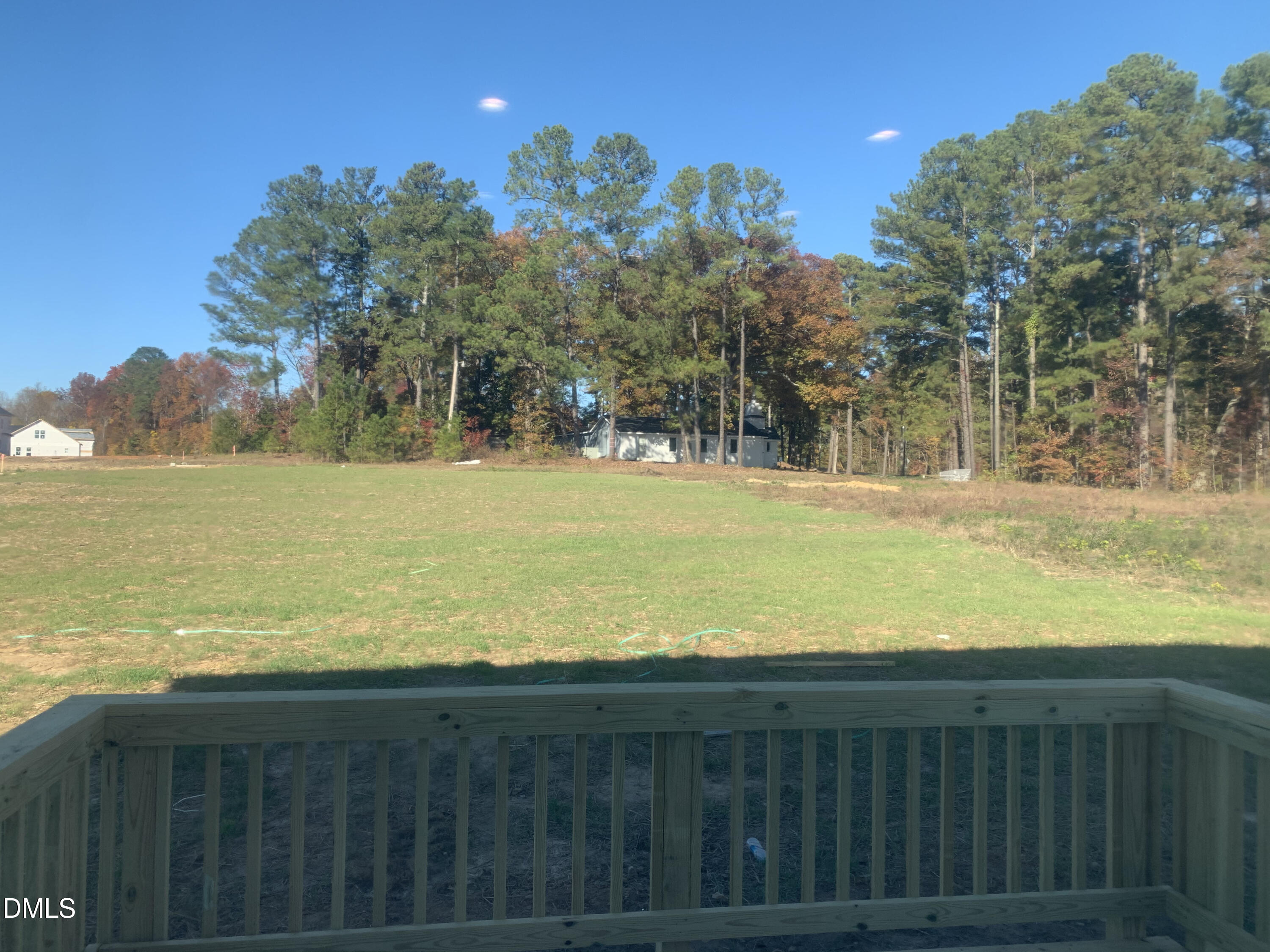 48 Weathervane Dr. Zebulon, NC 27597 - Photo 19 of 24 a view of an ocean from a yard