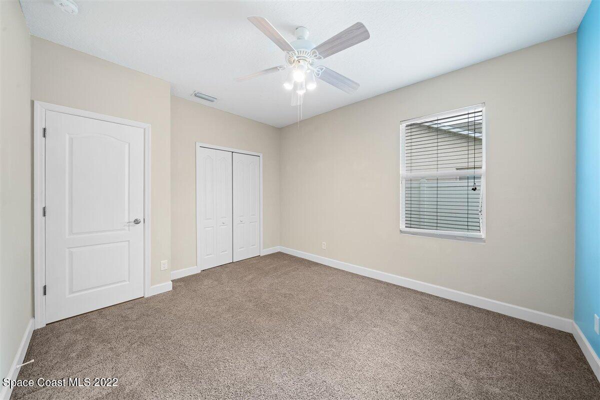 320 Pebble Hill Way Rockledge, FL 32955 - Photo 19 of 27 a view of an empty room with a window